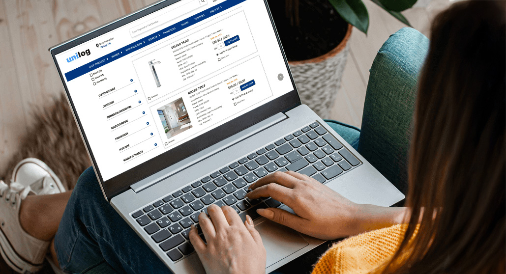woman-laptop-plumbing-product-page image of a plumbing product page